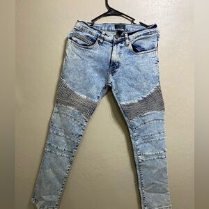 Young Men's Light Blue Jeans with Ripped Striped Accents